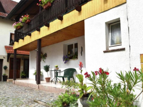 Holiday home in Thuringia with private terrace, use of a garden and pool, Römhild